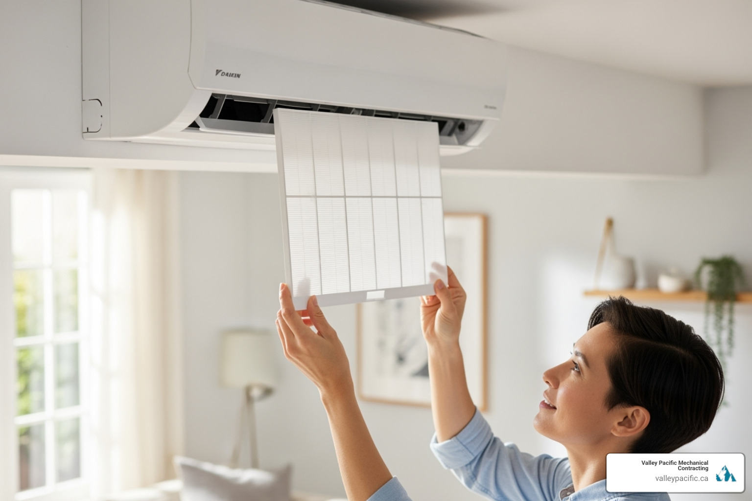 homeowner easily cleaning the filter of a Daikin indoor unit - Daikin ac installation
