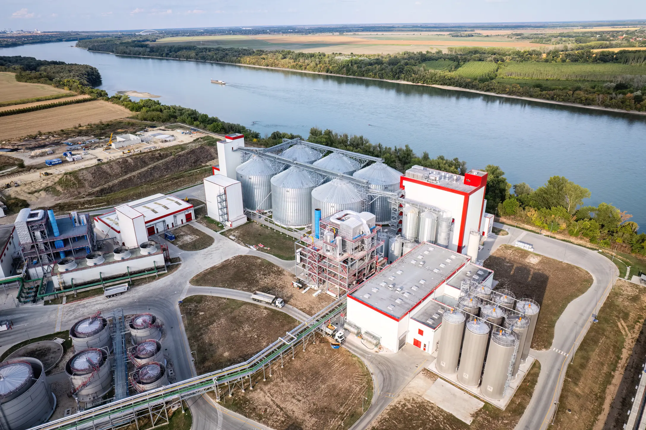 Aerial view of the new Pannonia Bio silos and processing buildings along the Danube