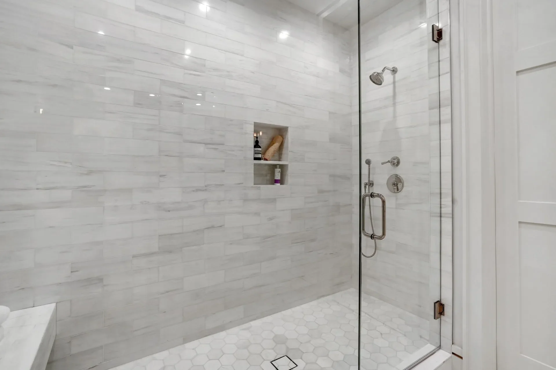 Glass shower and wall niche at South Bundy Drive.