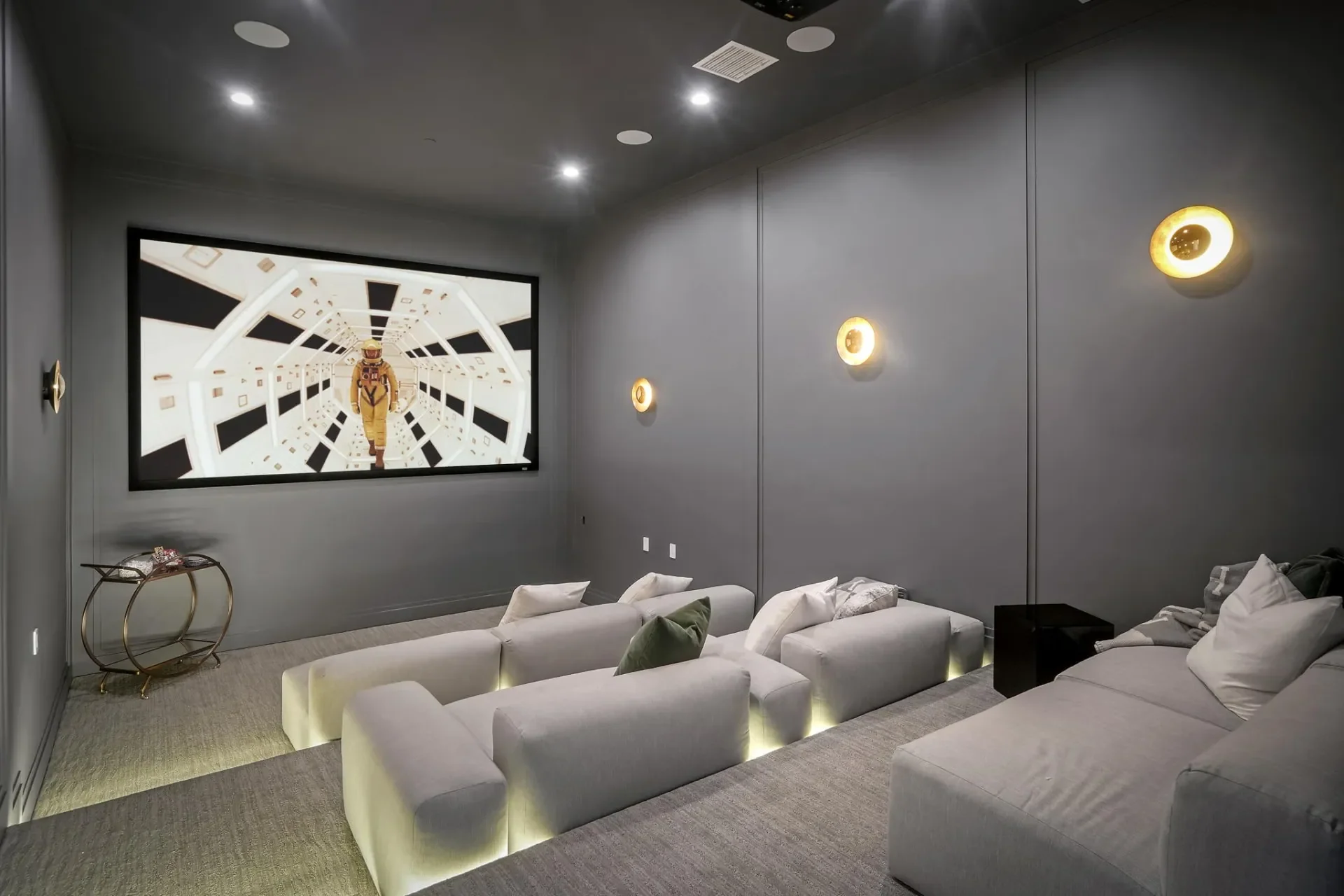 Cinema room with wall lights at South Bundy Drive.