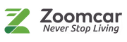 Zoomcar logo with the tagline Never Stop Living.