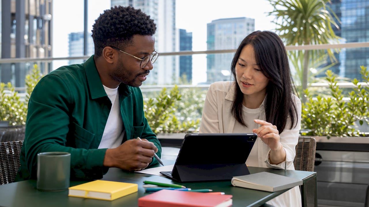 Tech professionals discussing AI marketing insights