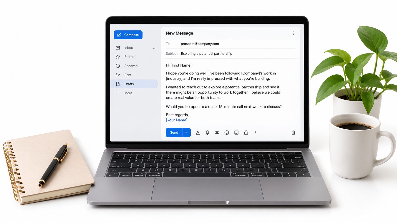 A laptop on a desk showing a professional cold email template draft for business outreach purposes.