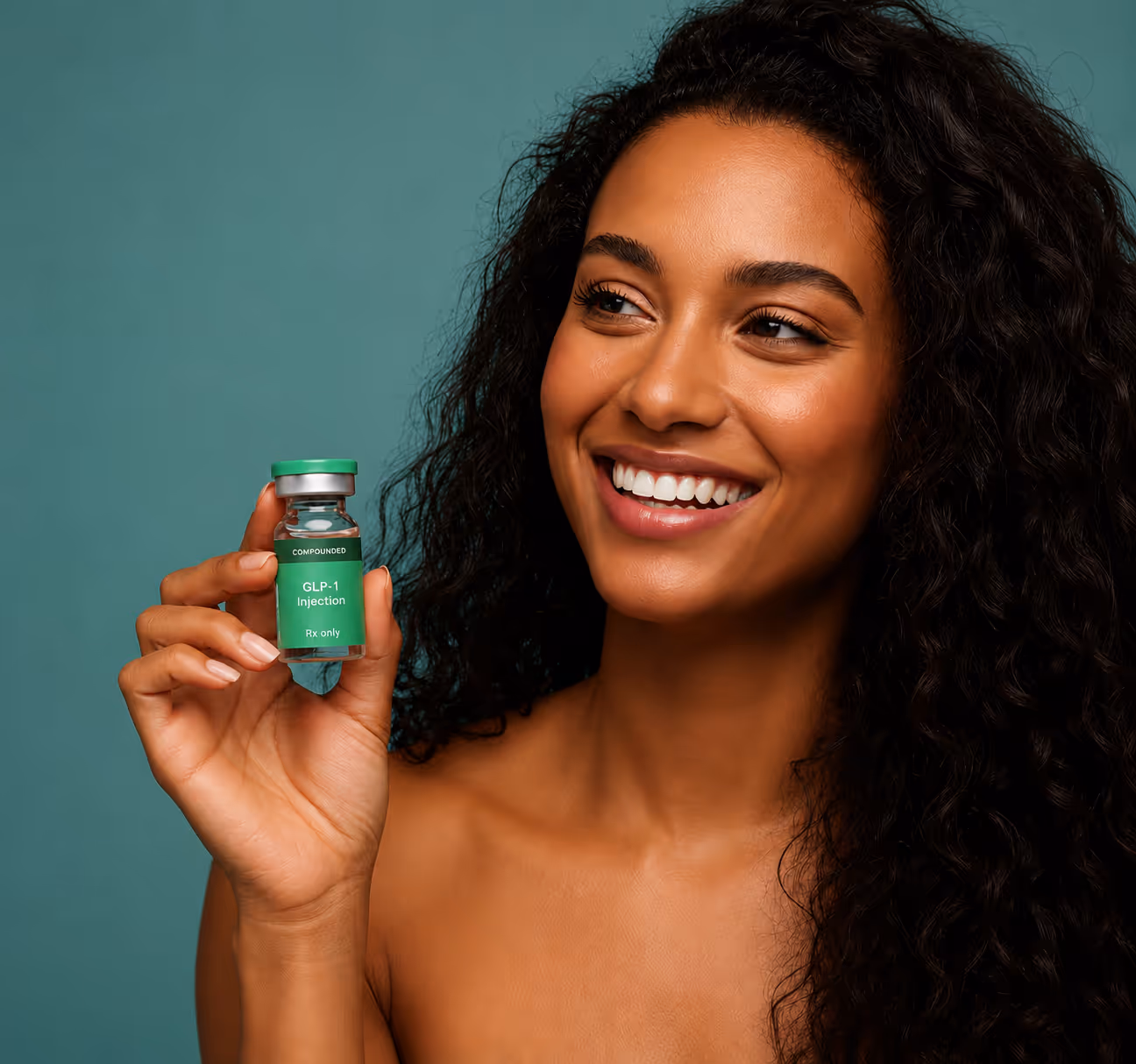 Smiling woman with curly hair holding a small vial labeled 'ivy GLP-1 Injection Rx only' against a teal background.