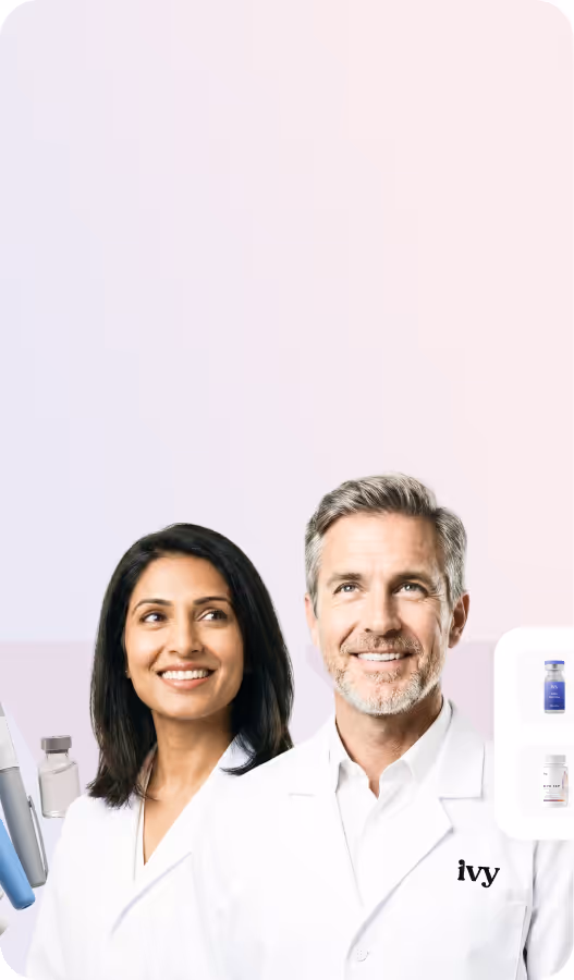 Smiling man in a white lab coat with ivy logo, with various medical cartridges and vials displayed around him.