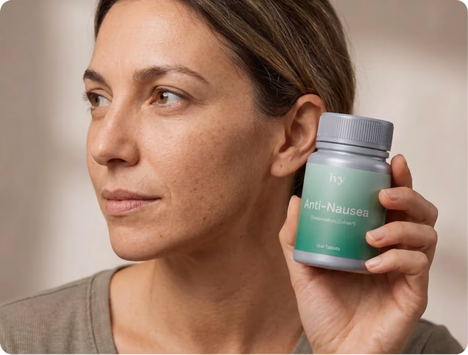 Smiling woman with curly hair holding a small vial labeled 'ivy GLP-1 Injection Rx only' against a teal background.