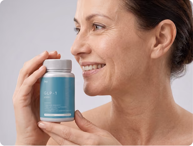 Smiling woman with curly hair holding a small vial labeled 'ivy GLP-1 Injection Rx only' against a teal background.