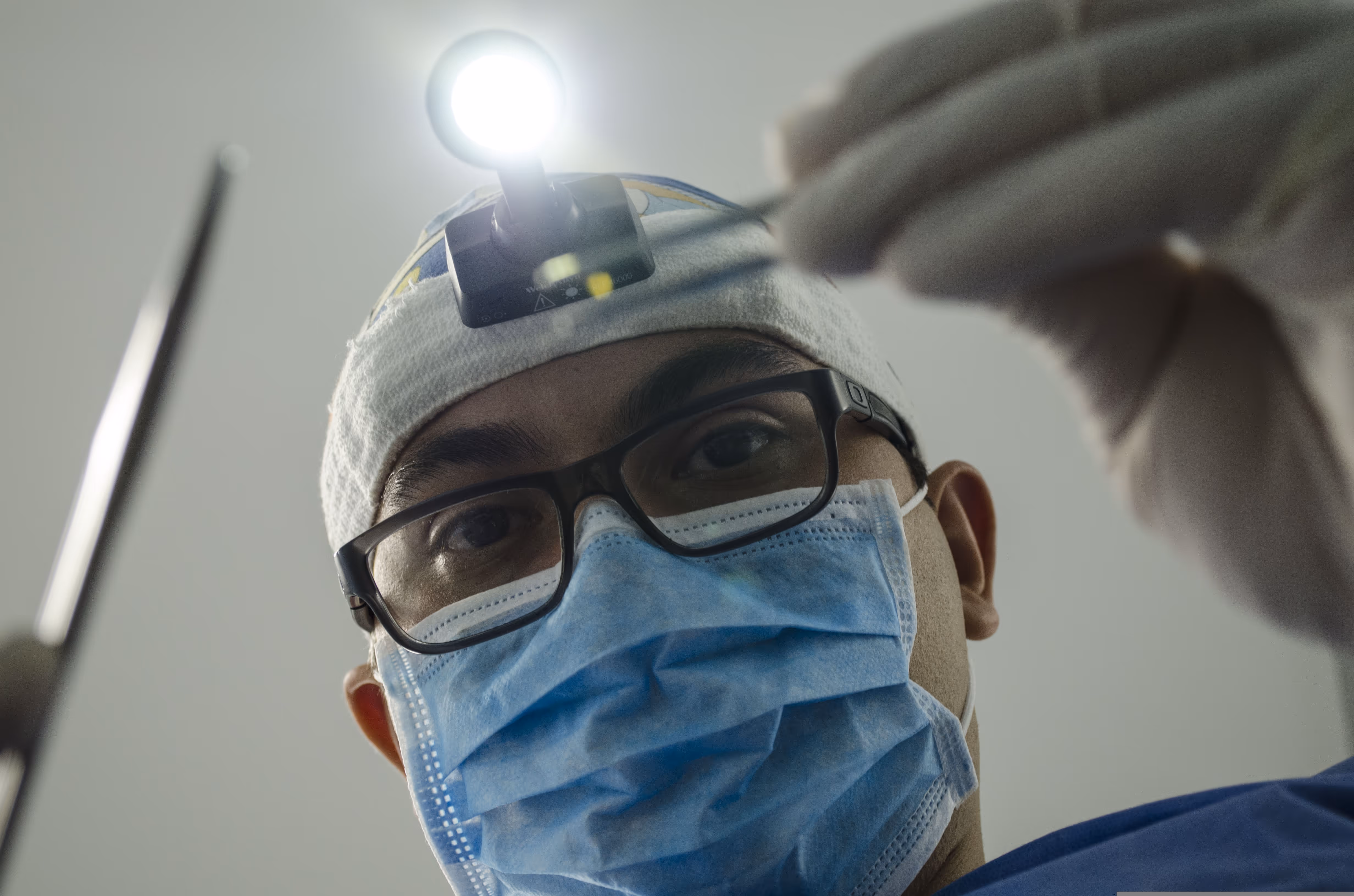 Dentist installing filling