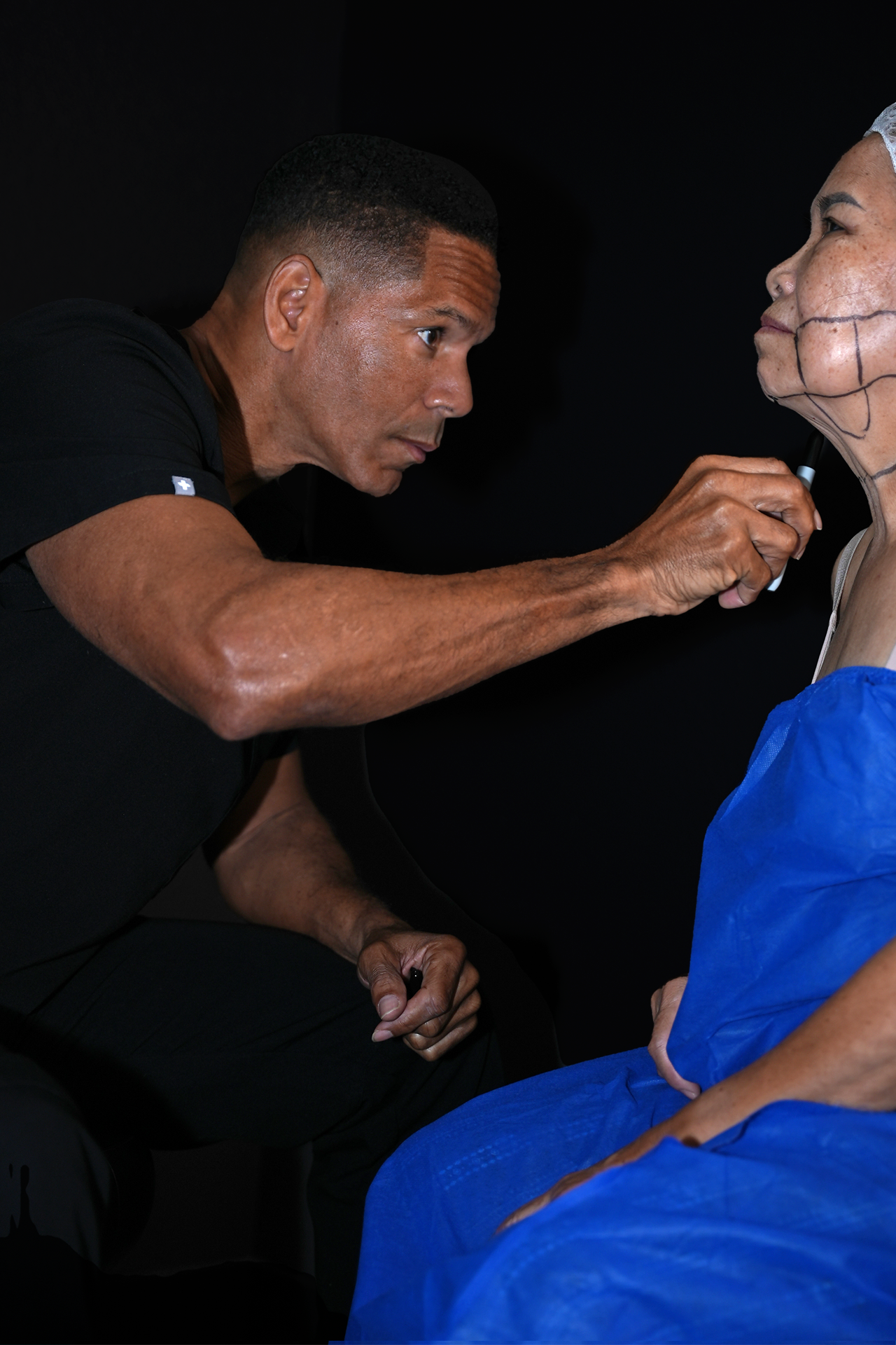 Dr. Gibbs marking his patient for surgery.