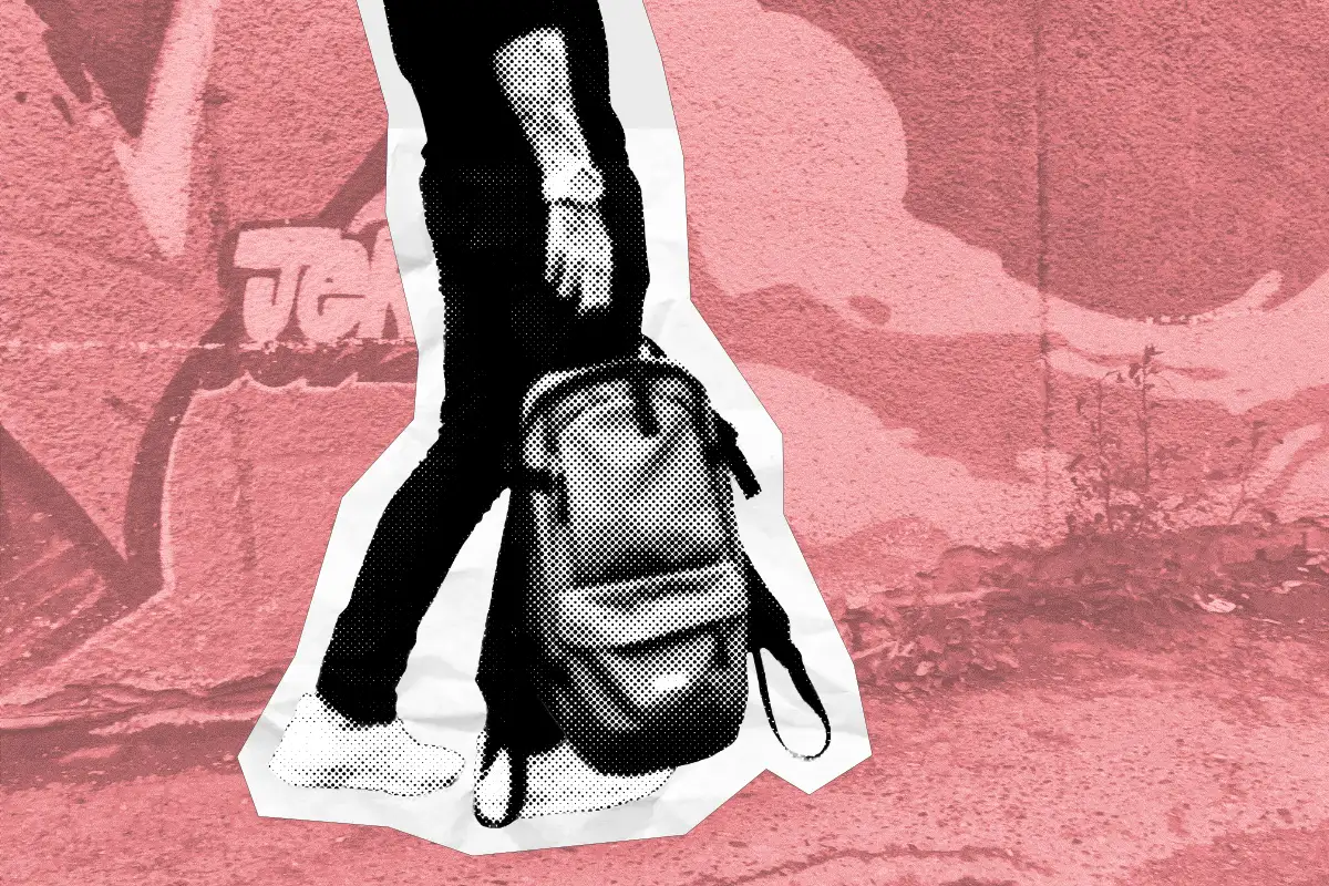 A man holding a backpack