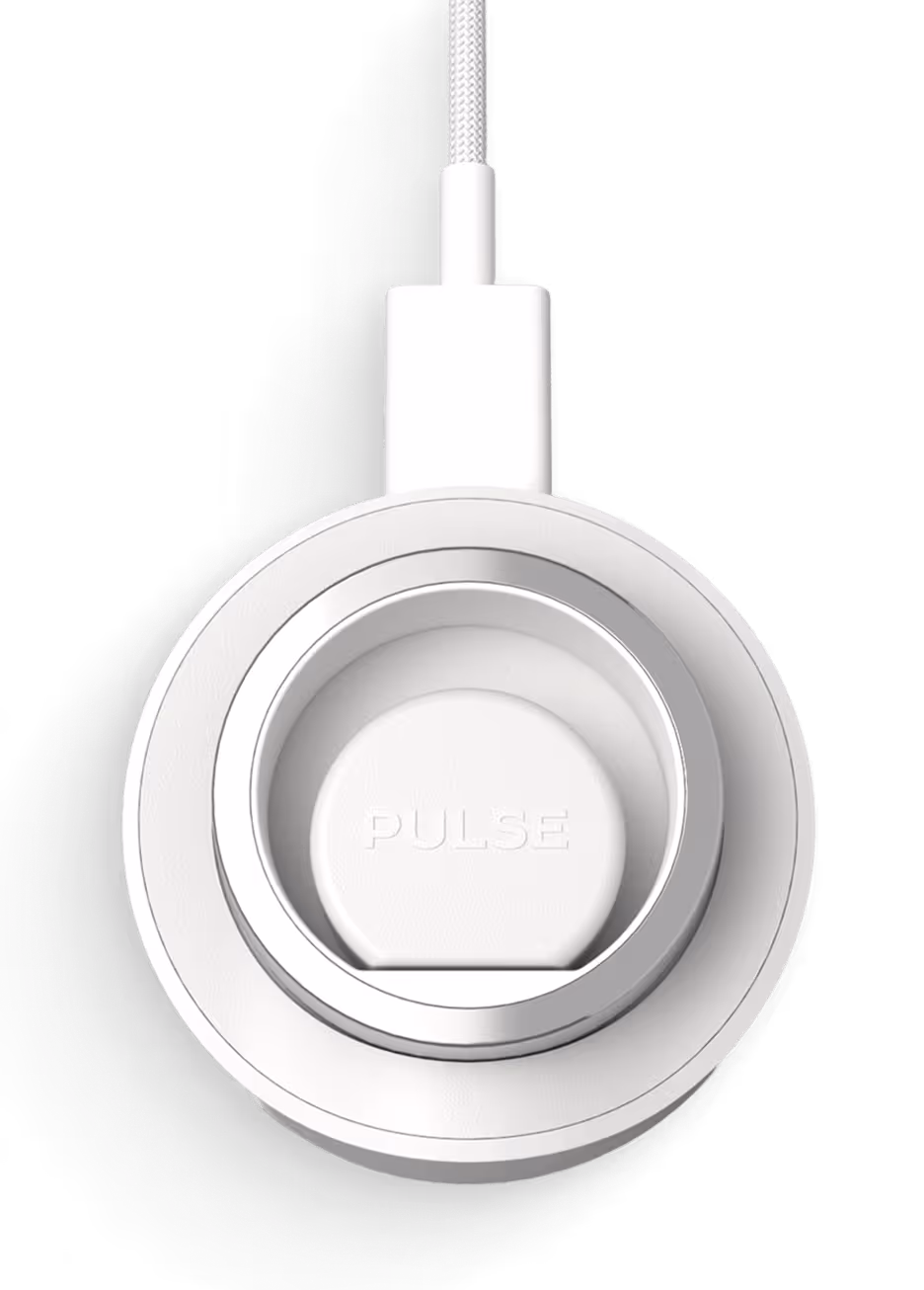 White Pulse branded round magnetic charger with braided cable attached.
