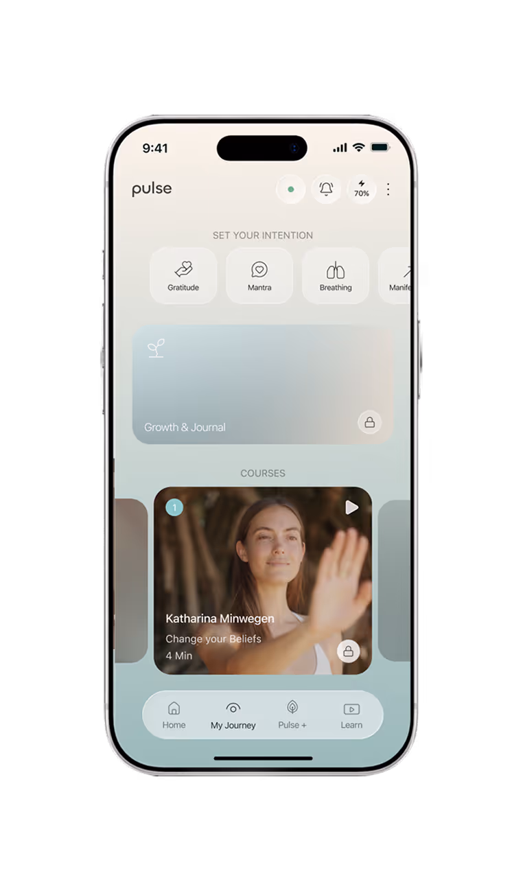 Mobile app screen with mindfulness options like gratitude, mantra, breathing, and a course titled Change your Beliefs.