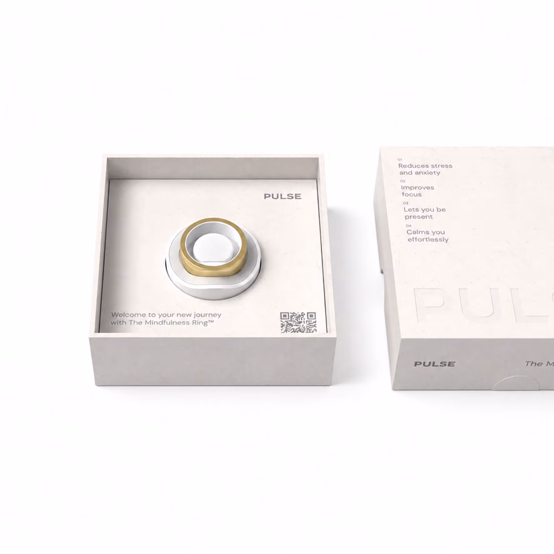 Gold mindfulness ring in a white box labeled PULSE with benefits listed on the lid.