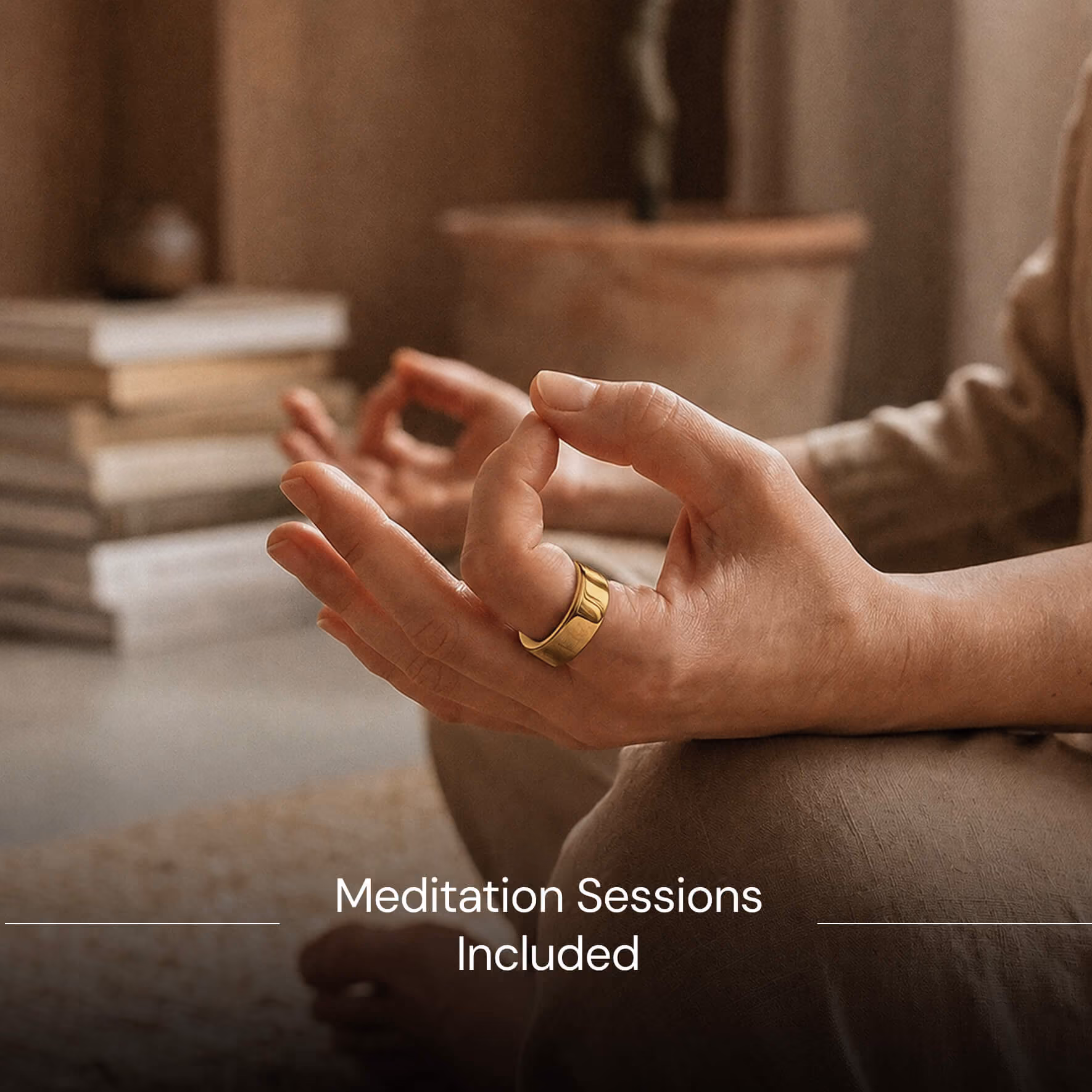 Close-up of hands in meditation pose with a gold ring on finger and blurred background.