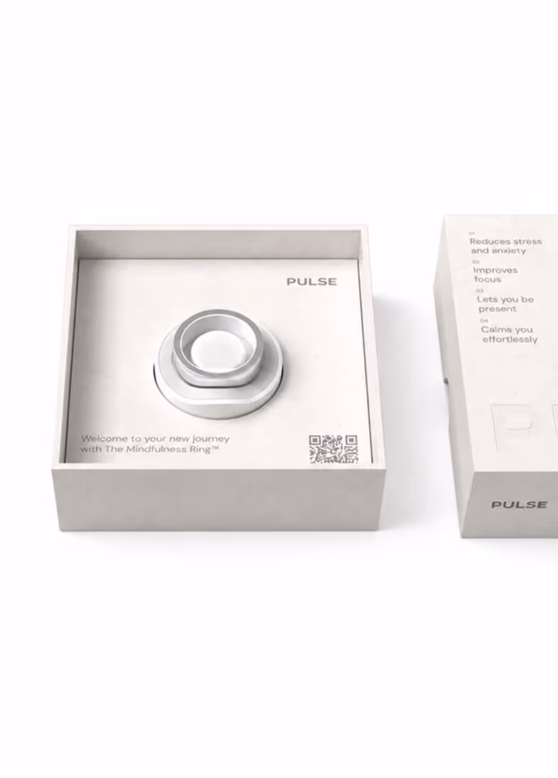 Silver mindfulness ring in a white box labeled Pulse with text on benefits and a QR code.