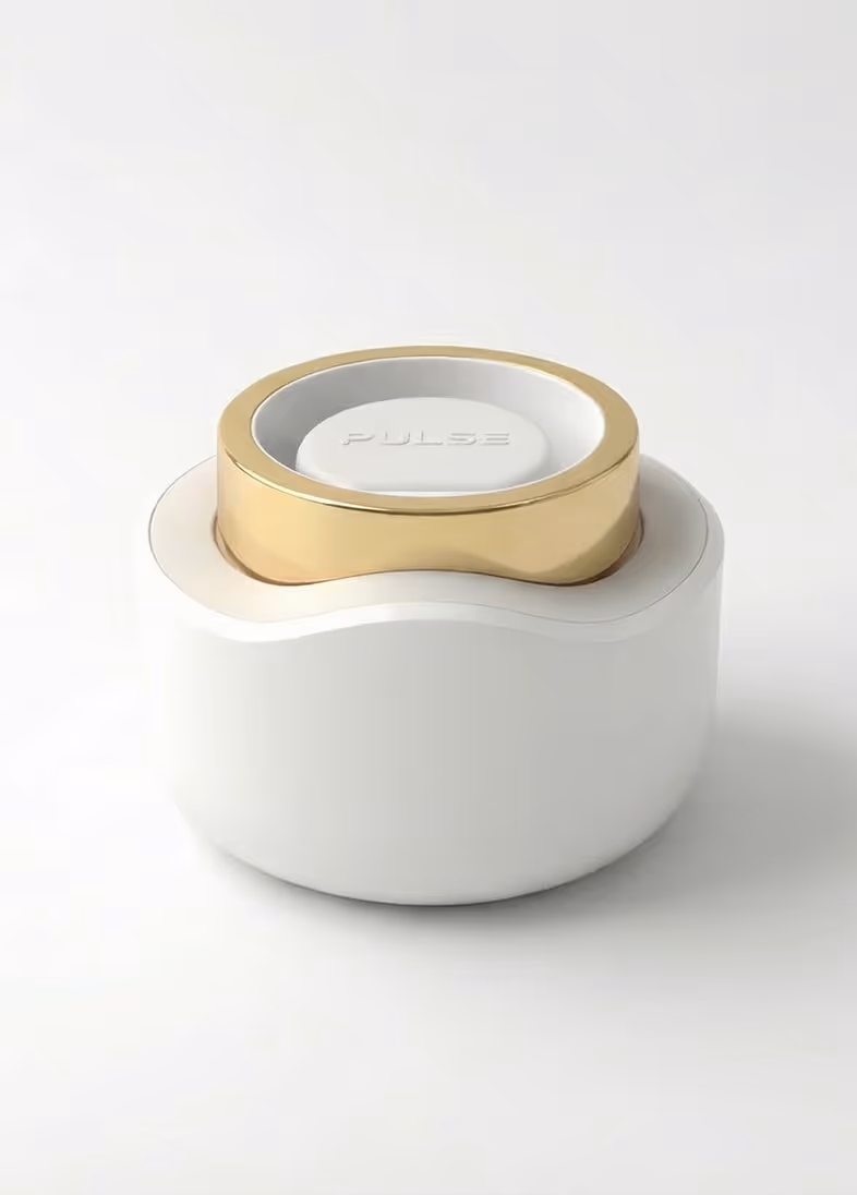 White and gold compact device with the word 'PULSE' embossed on the top center.