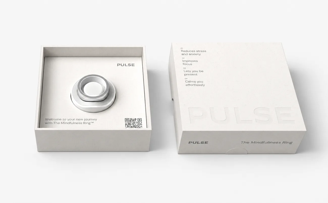The open Pulse box with the ring inside and a second box beside it