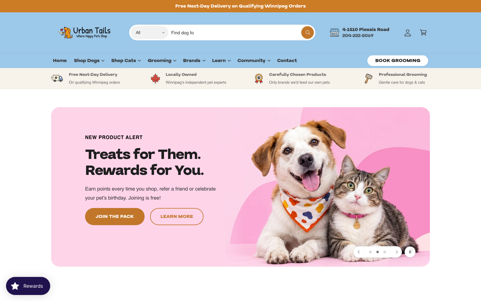 Urban Tails homepage with a dog and a cat on a pink background, promoting the Winnipeg pet store's new loyalty program.