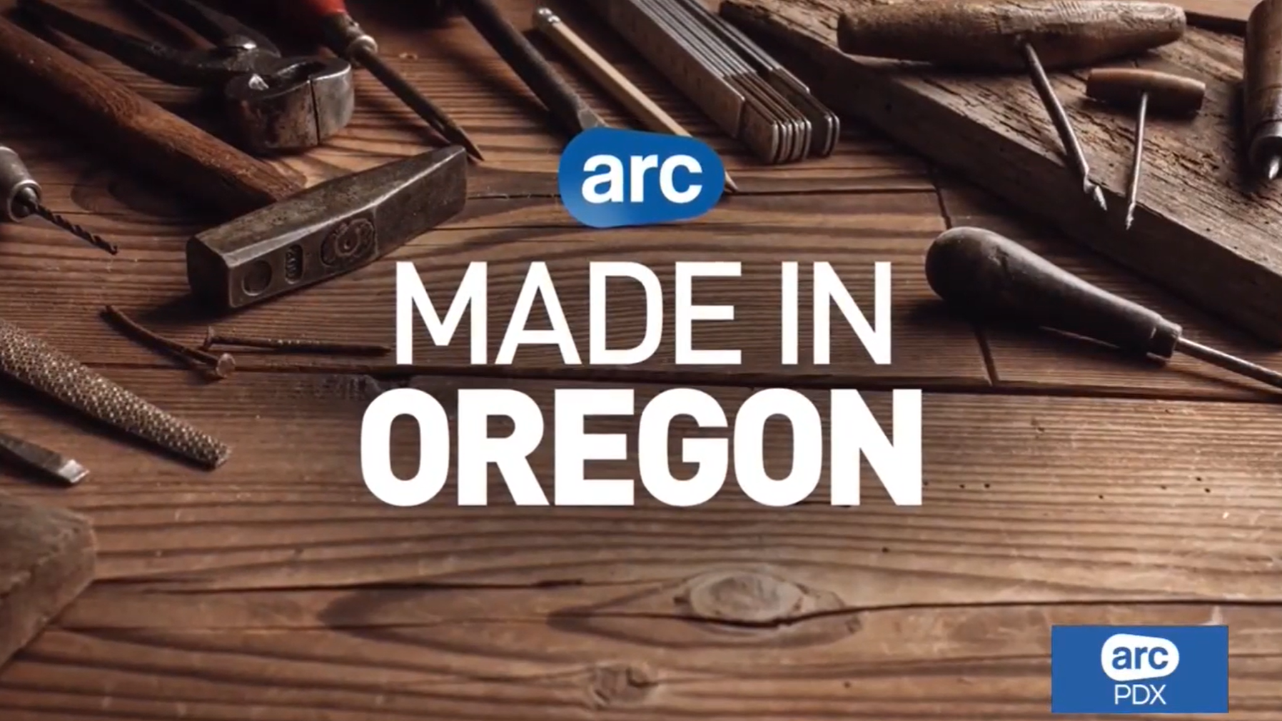 Arc Made in Oregon with tools on a wood table