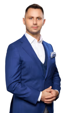 Zdzisław Bonalski, radca prawny specjalizujący się w restrukturyzacji i prawnej ochronie firm, w eleganckim granatowym garniturze.