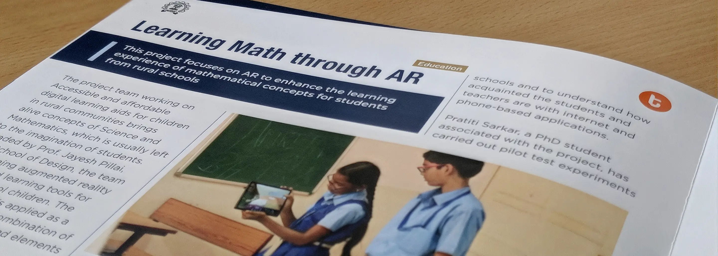 A printed copy of the research paper, Learning Math through AR