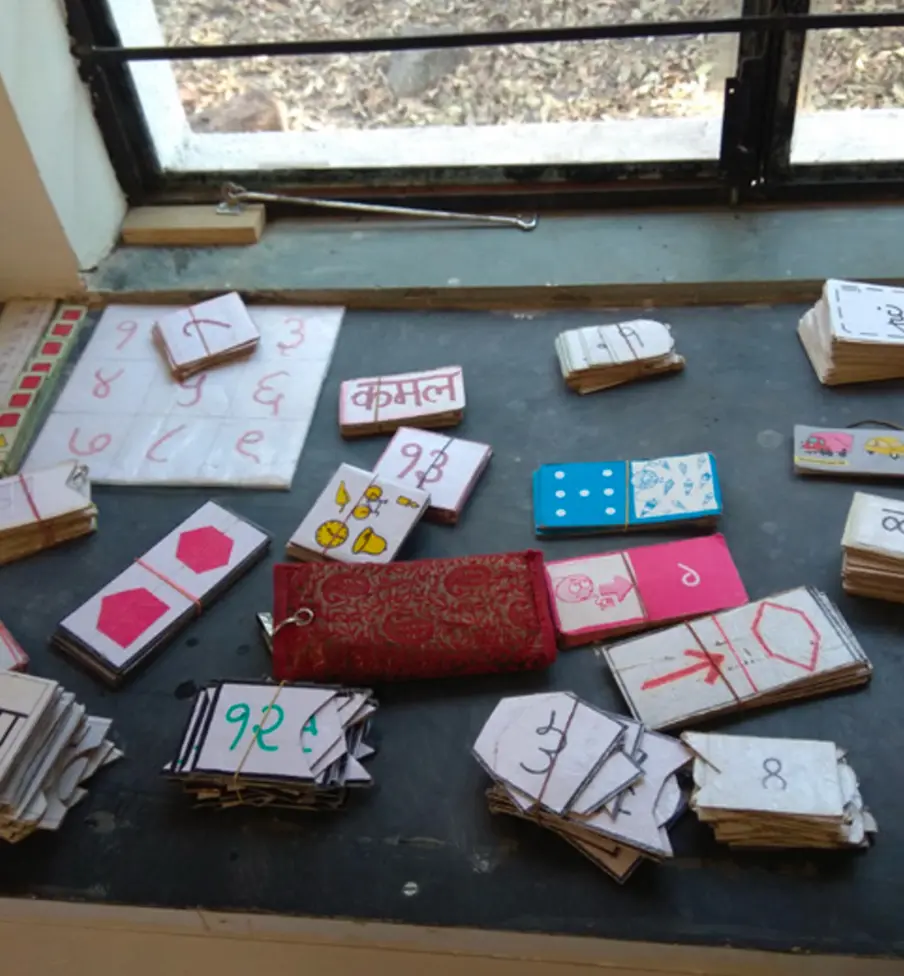 Printed augmented reality marker cards laid out on the floor