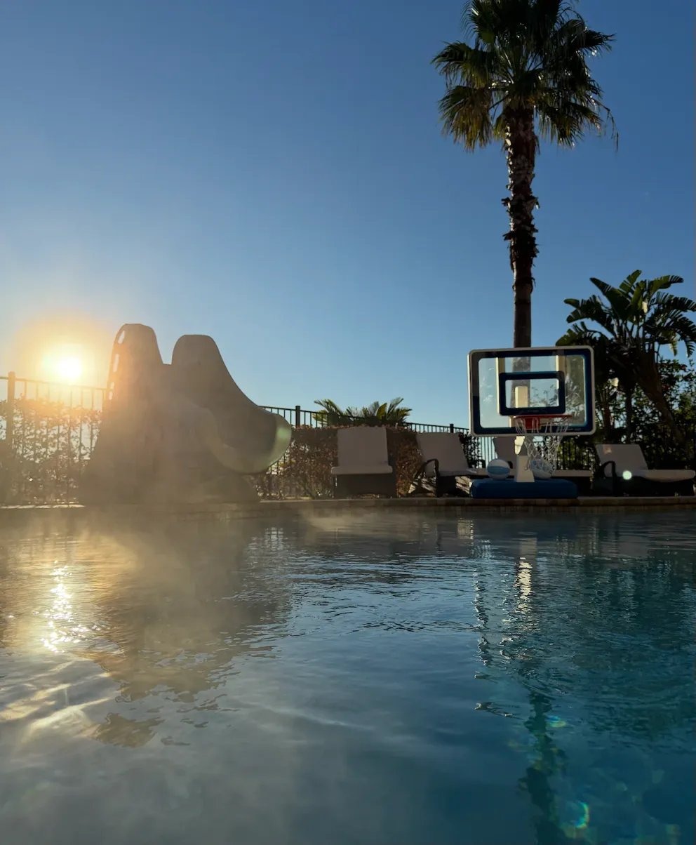 Arcade and game room at The Luxe Palmilla — air hockey, foosball, and arcade games