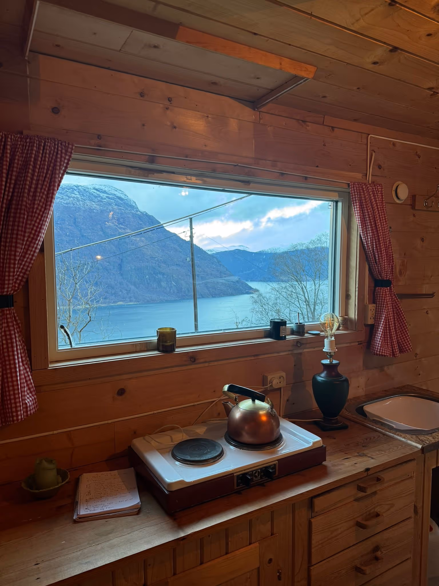 Cabin from the outside, door open 