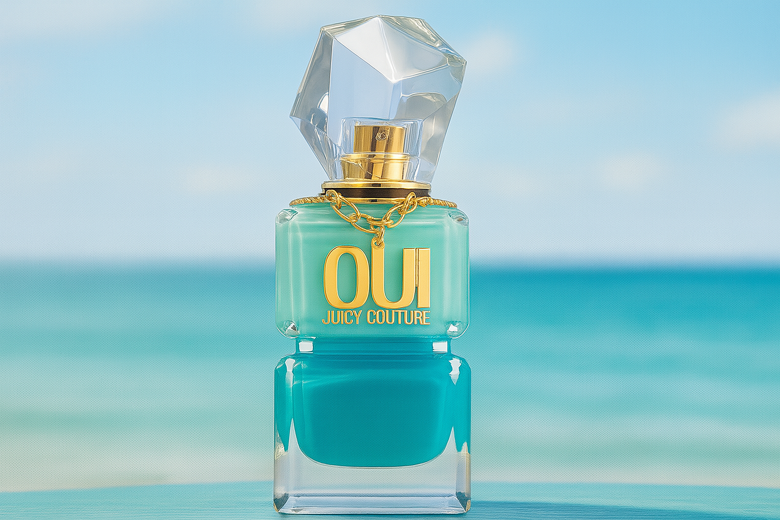 Oui Juicy Couture perfume bottle with ocean backdrop.