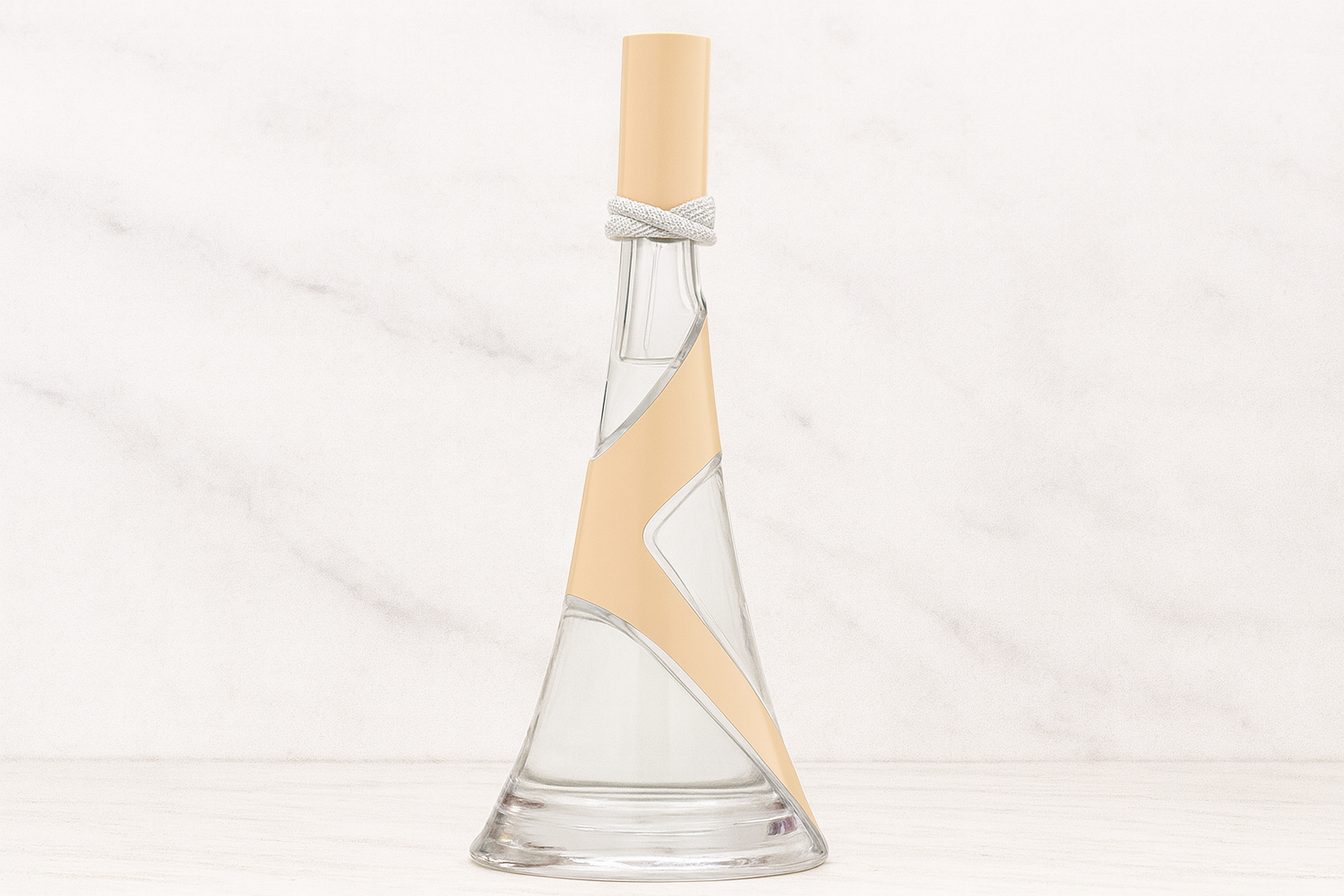 Rihanna Nude bottle against a light background.