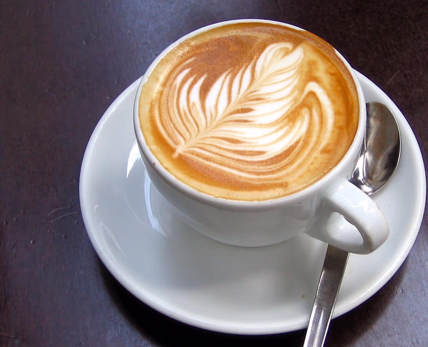 A coffee on a wooden table