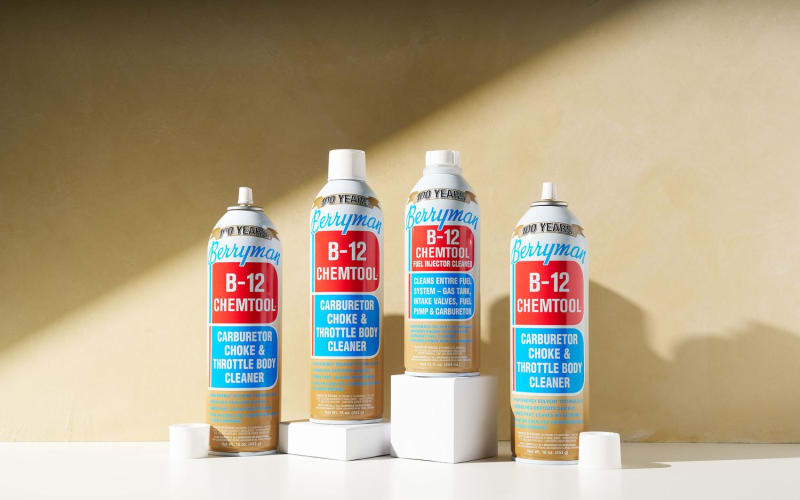 Berryman B-12 Chemtool product lineup on white pedestals with natural diagonal lighting