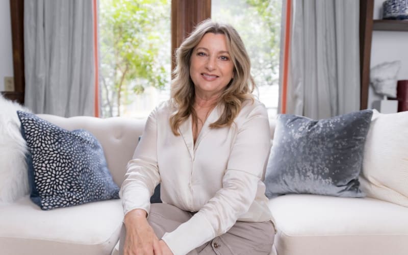 Professional brand portrait session showing a woman in a contemporary office environment