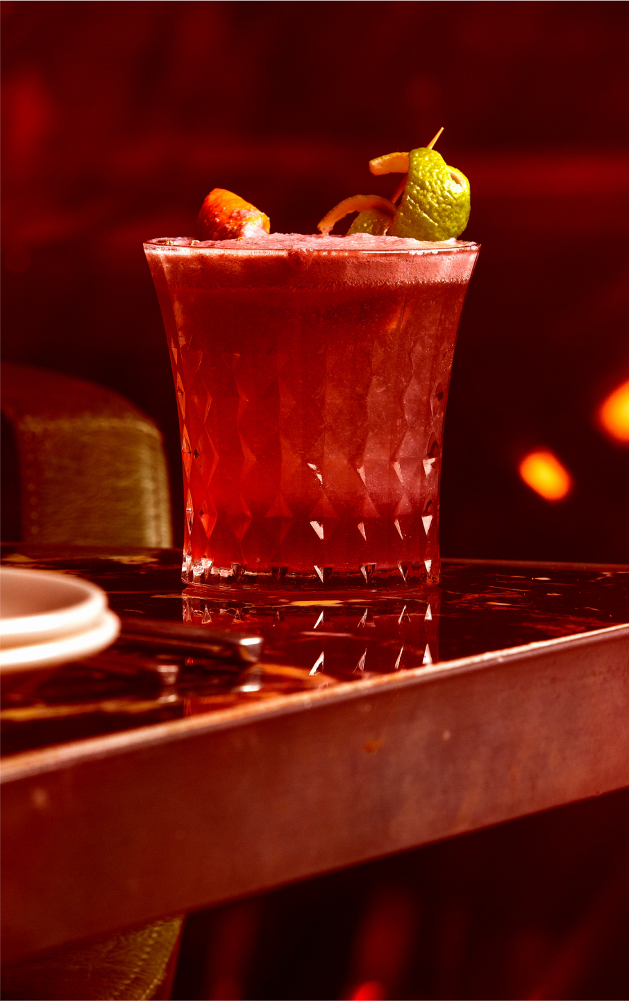 Kali Dining Room cocktail presentation with elegant bar ambiance