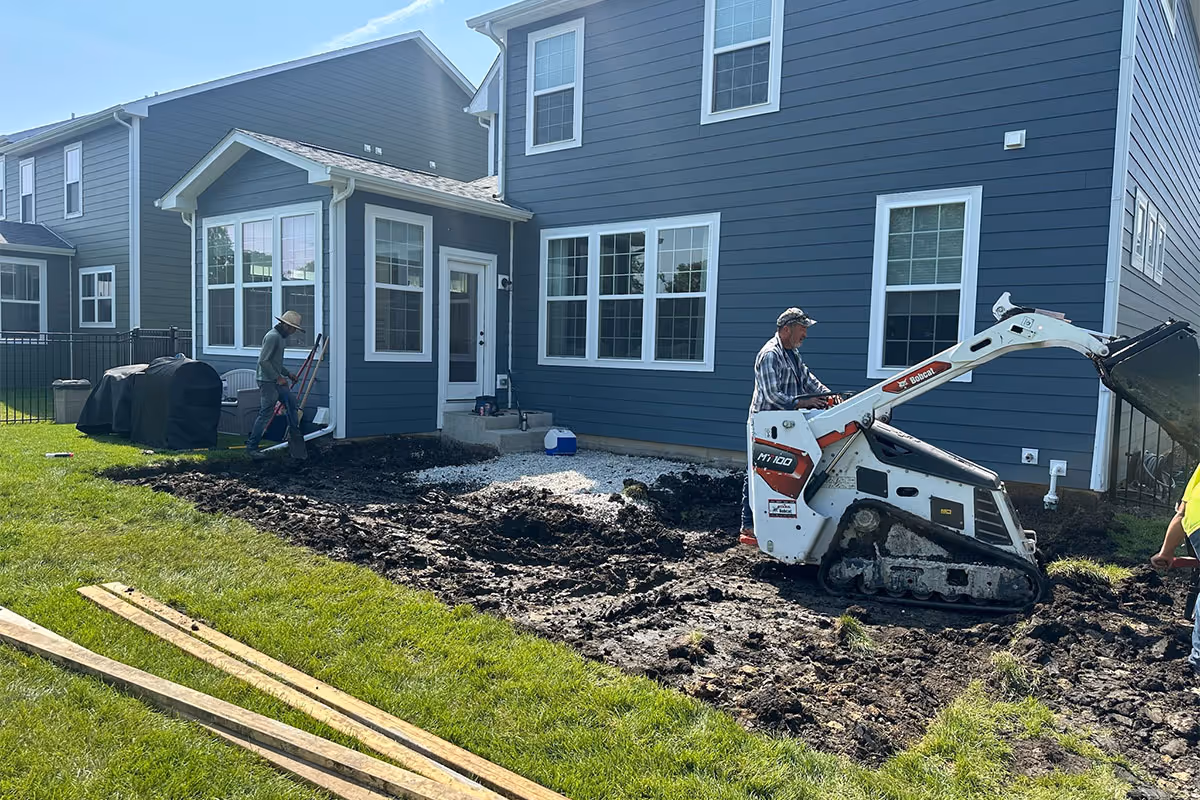 Concrete installation project is in progress for a Lockport home.