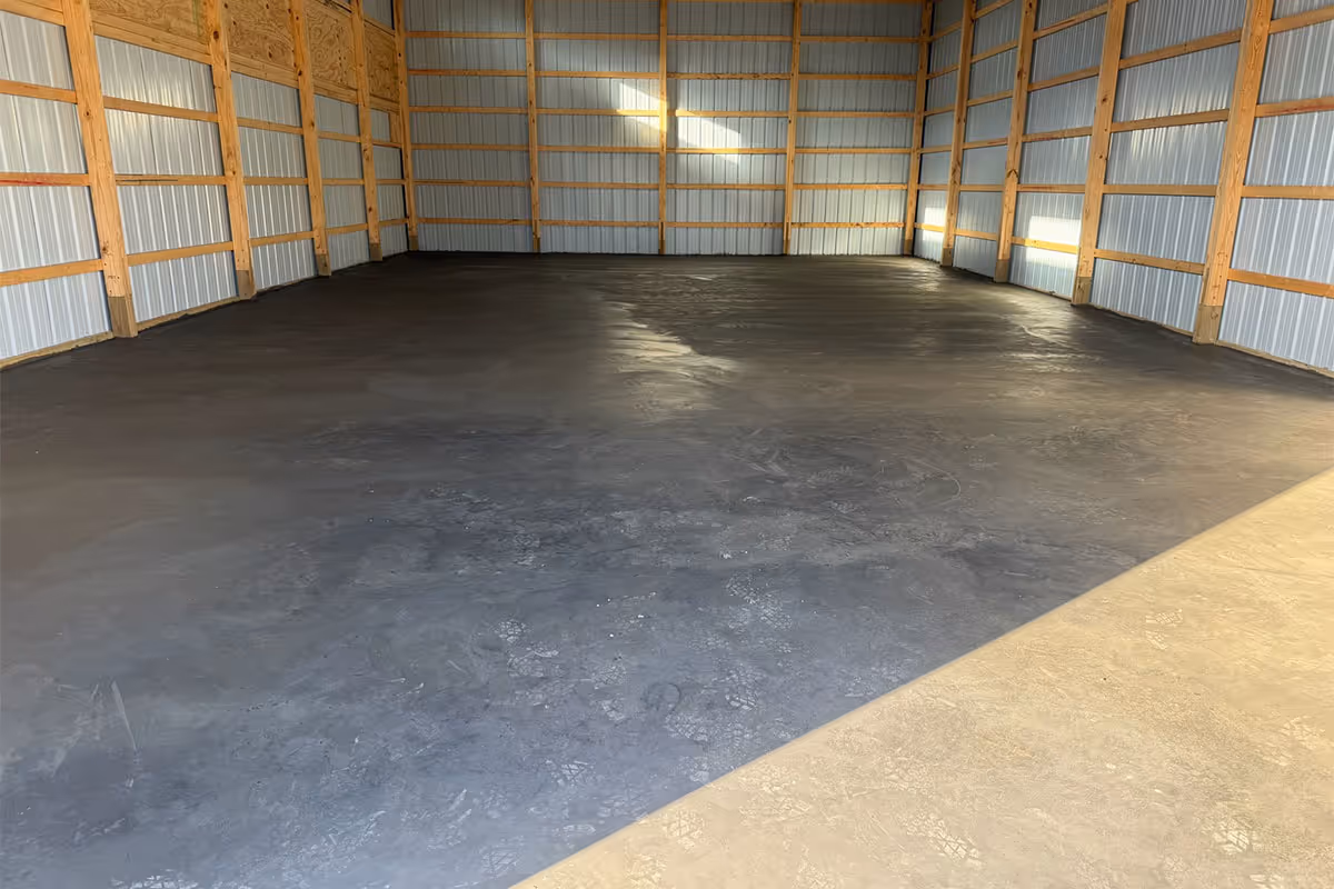 Concrete that has been poured for a garage floor.