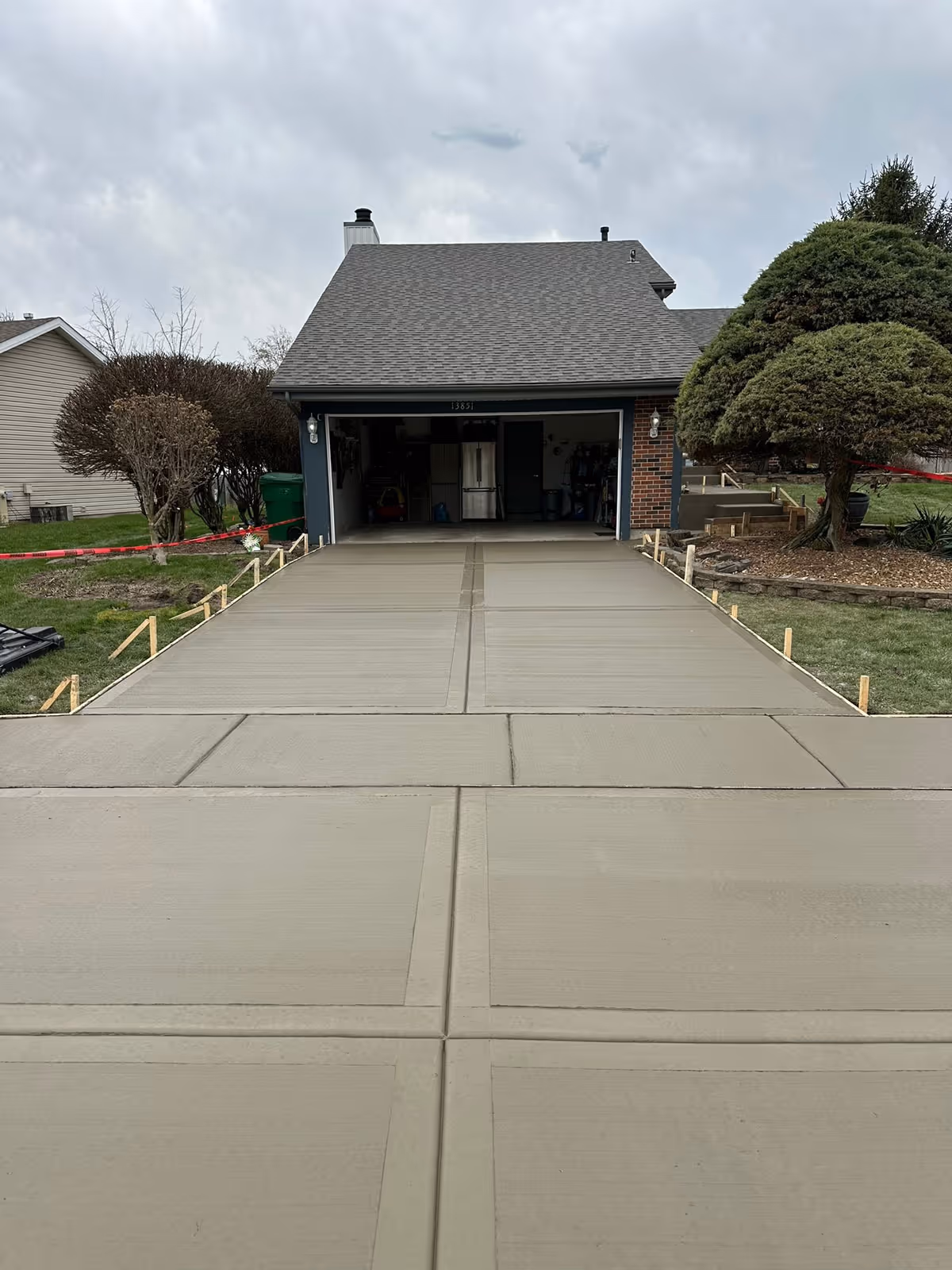 A brand new concrete driveway installation.