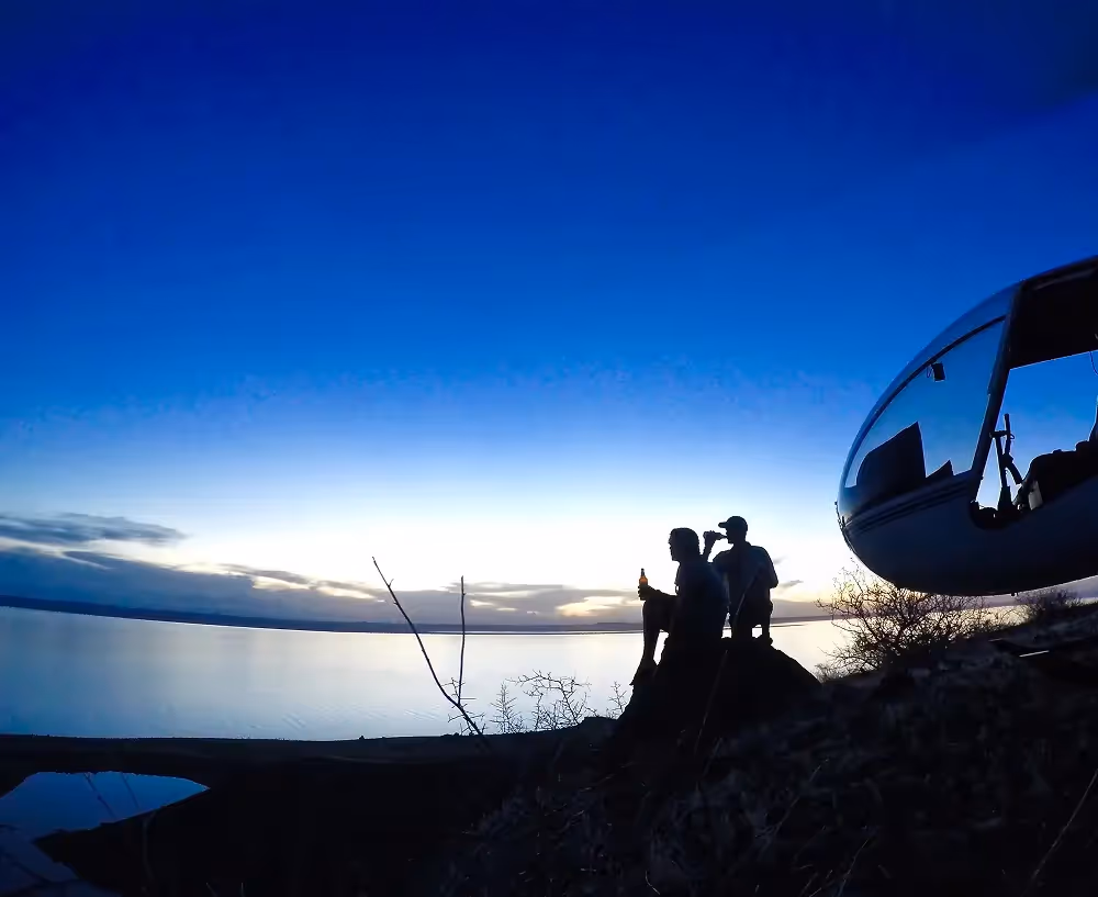 Sundowners in front of heli