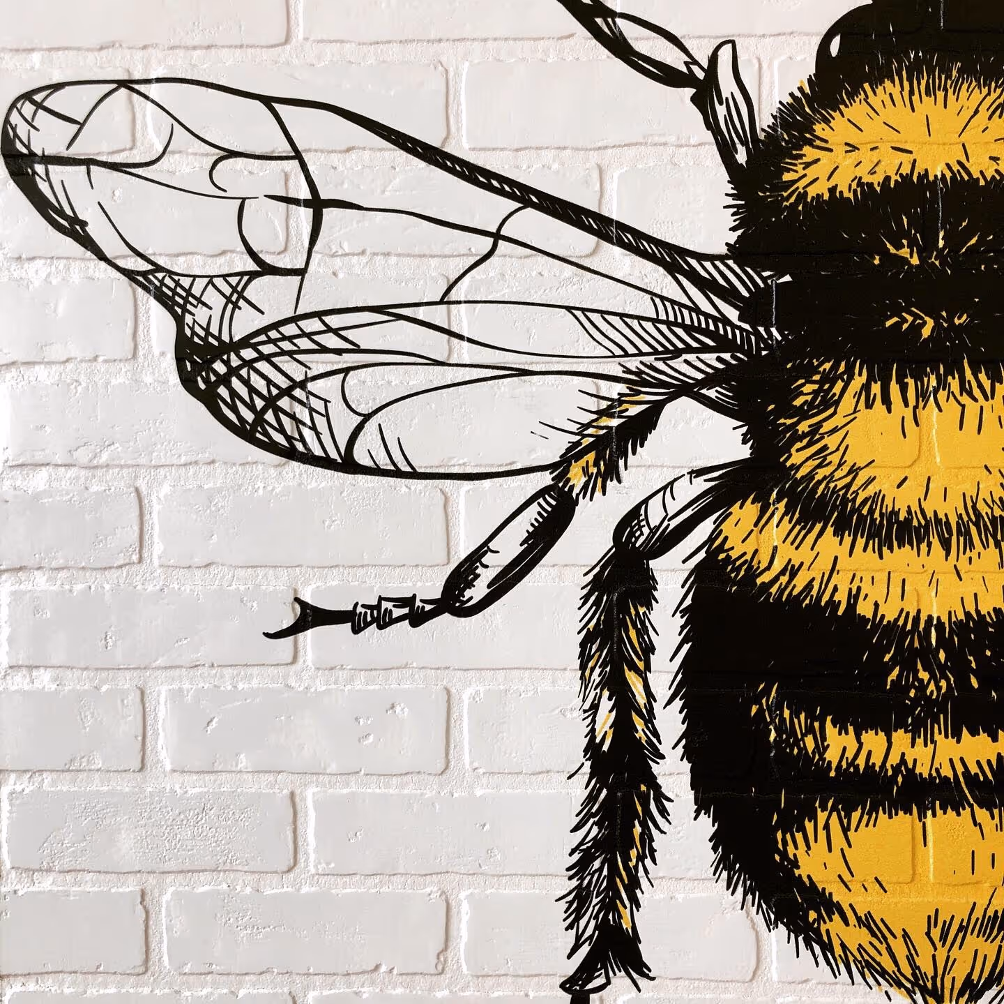 Bumble bee printed on brick using a wall printer