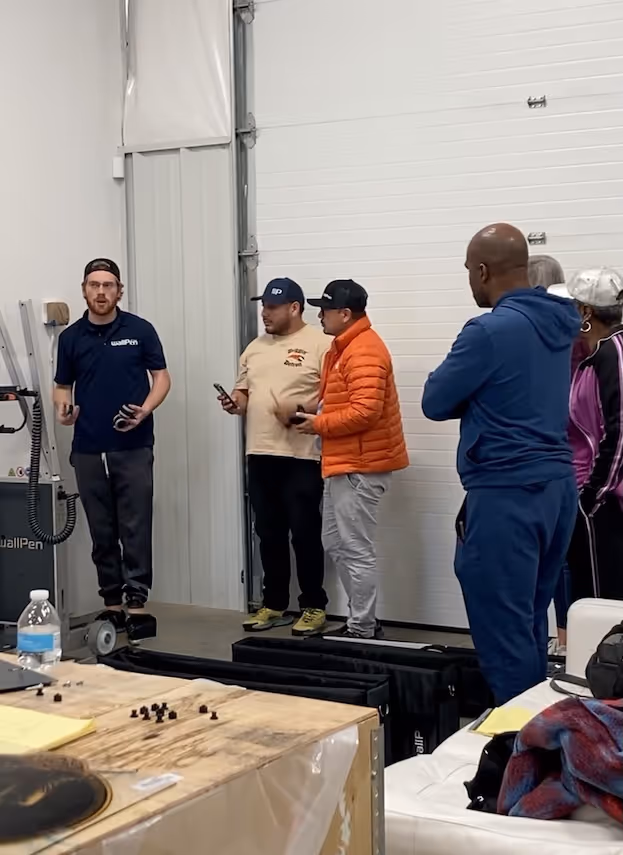 Instruction training operators on how to use a wall printer
