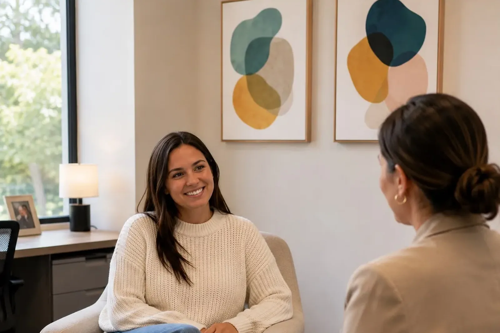 Patient talking with a provider during a consultation about psychologist vs psychiatrist care