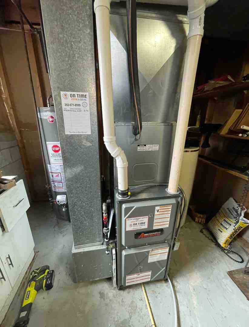 High-efficiency furnace system installed in a clean, organized residential basement in Waukesha - how being the fastest