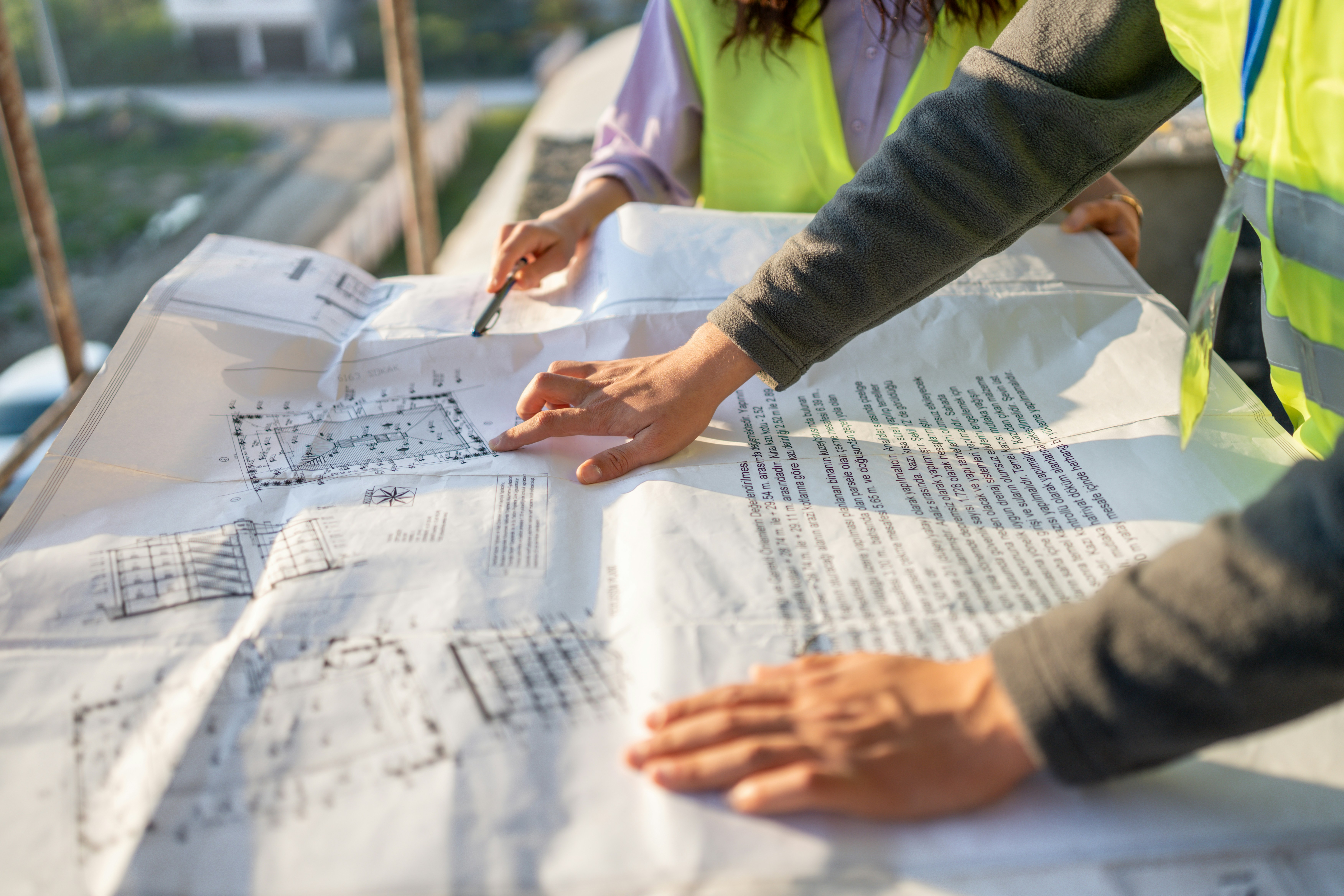 PM reviewing plans on site