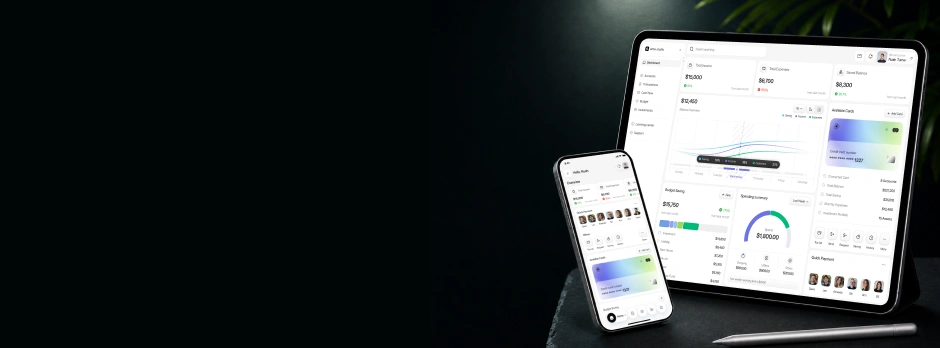 Tablet and phone displaying financial dashboard with charts, graphs, and budget data on dark background.