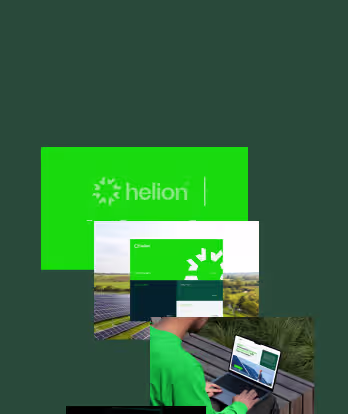 A person in a green shirt working on a laptop outdoors with solar panels and green fields in the background, with the Helion logo and website interface displayed.