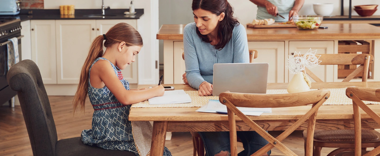 Family playing a fun math game together before the school year starts