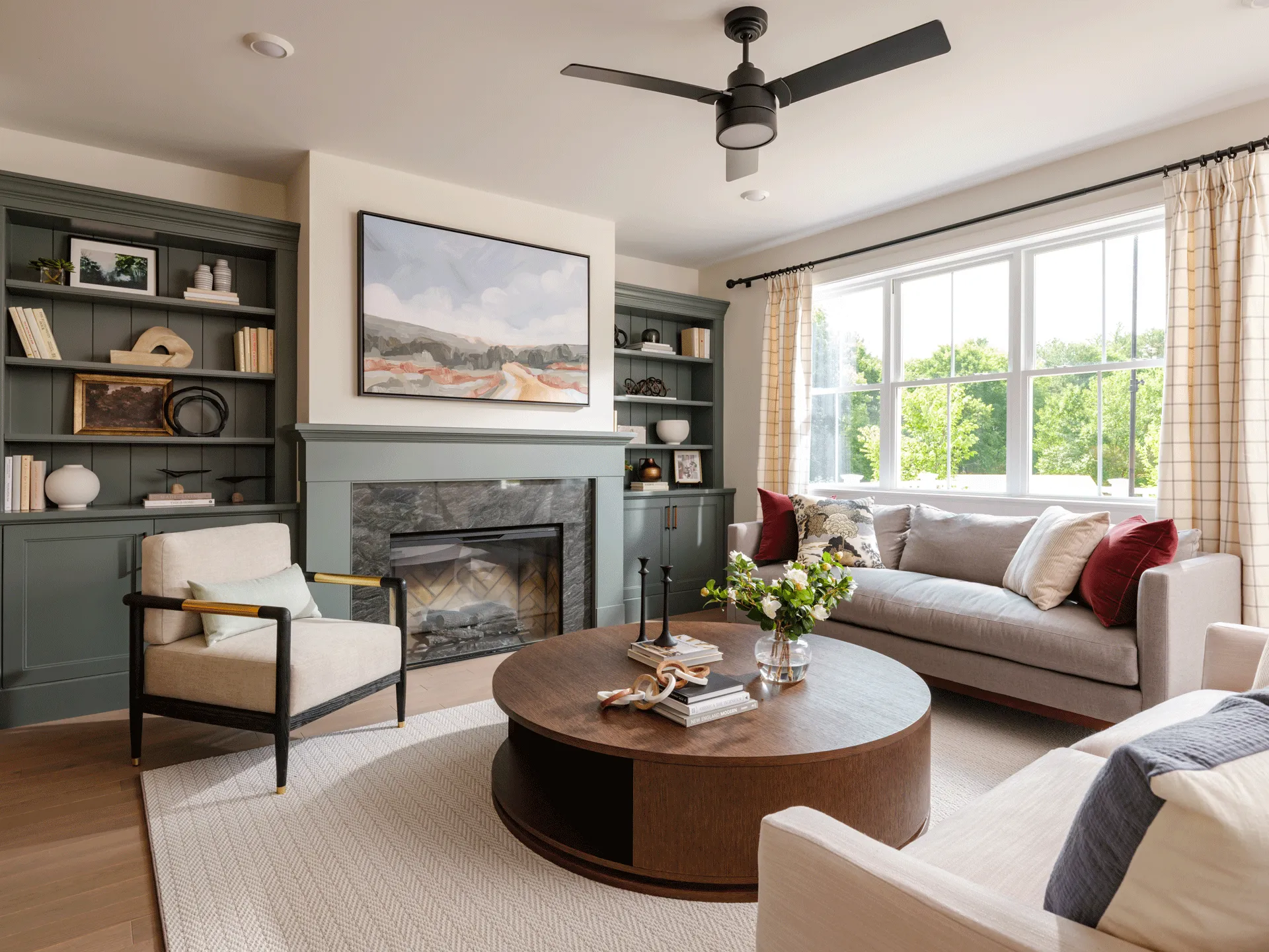 (title) Open-Plan Kitchen & Living (description) Open-plan kitchen and living at Larkwood — new construction townhomes in Raynham, MA with hardwood floors and vaulted ceilings.