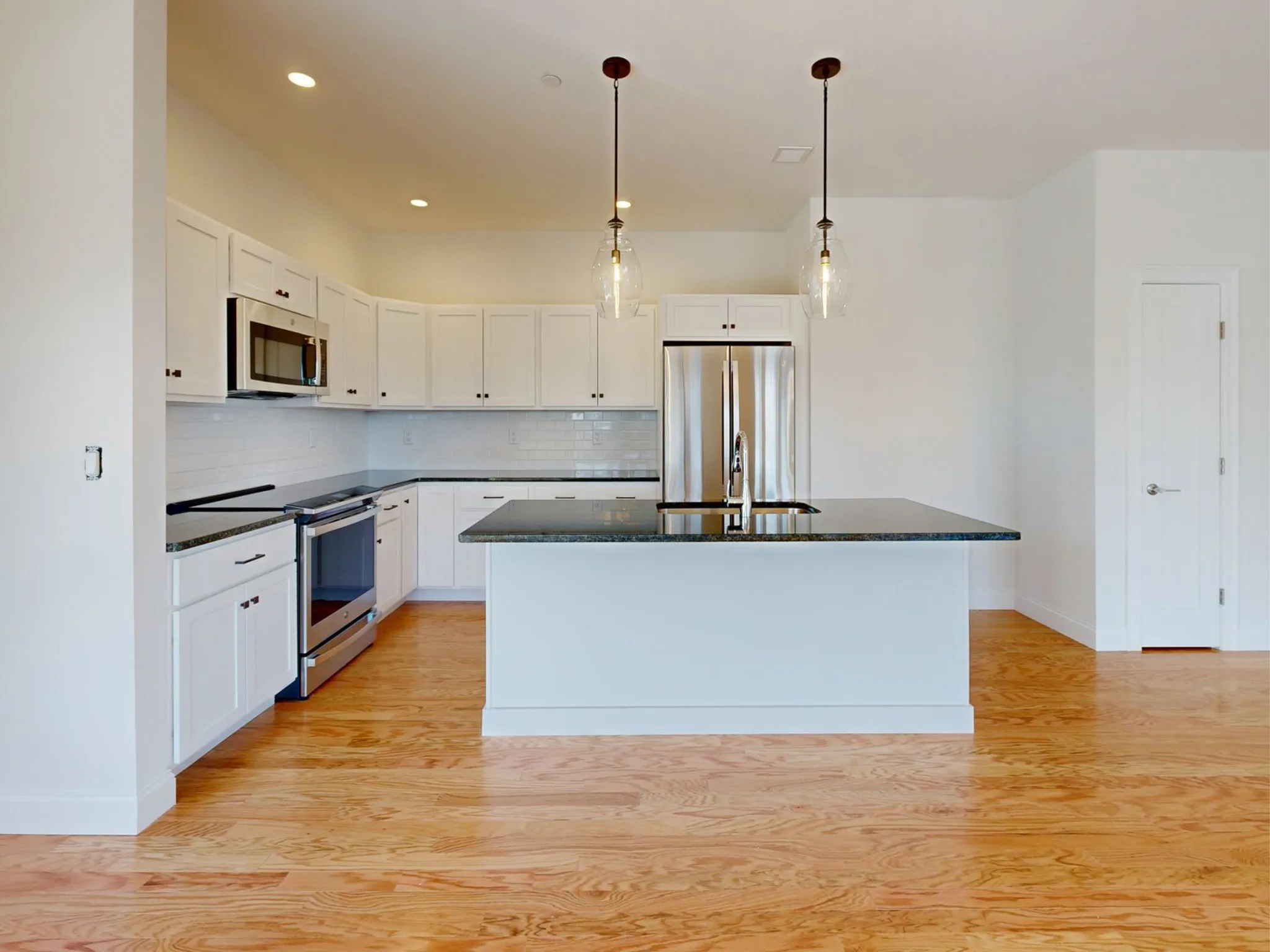 Kitchen with designer finishes in the Wind II at Featherwinds in Halifax MA