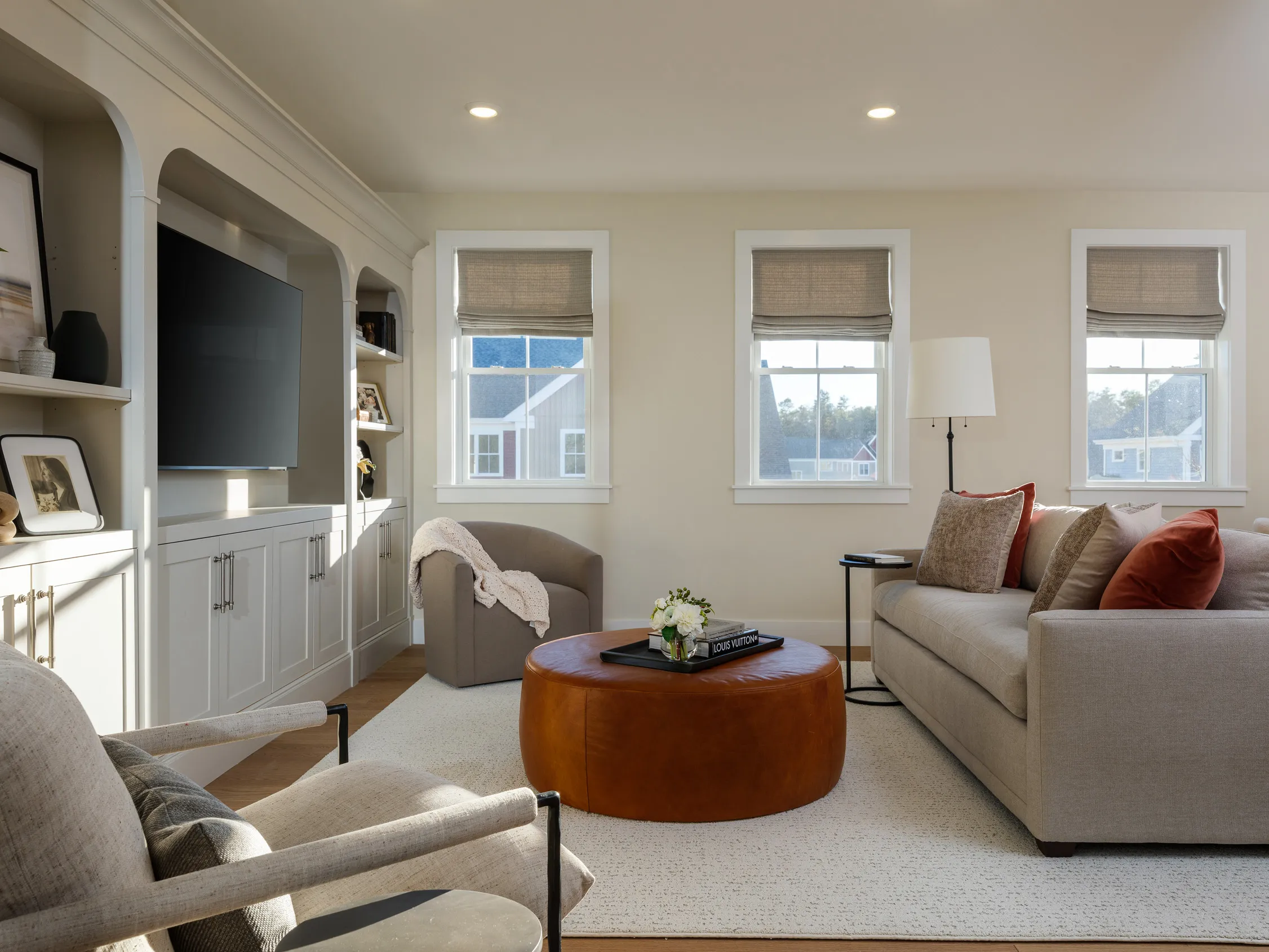 Living room with custom built-ins in the Pine at Alden's Reach in Plymouth MA