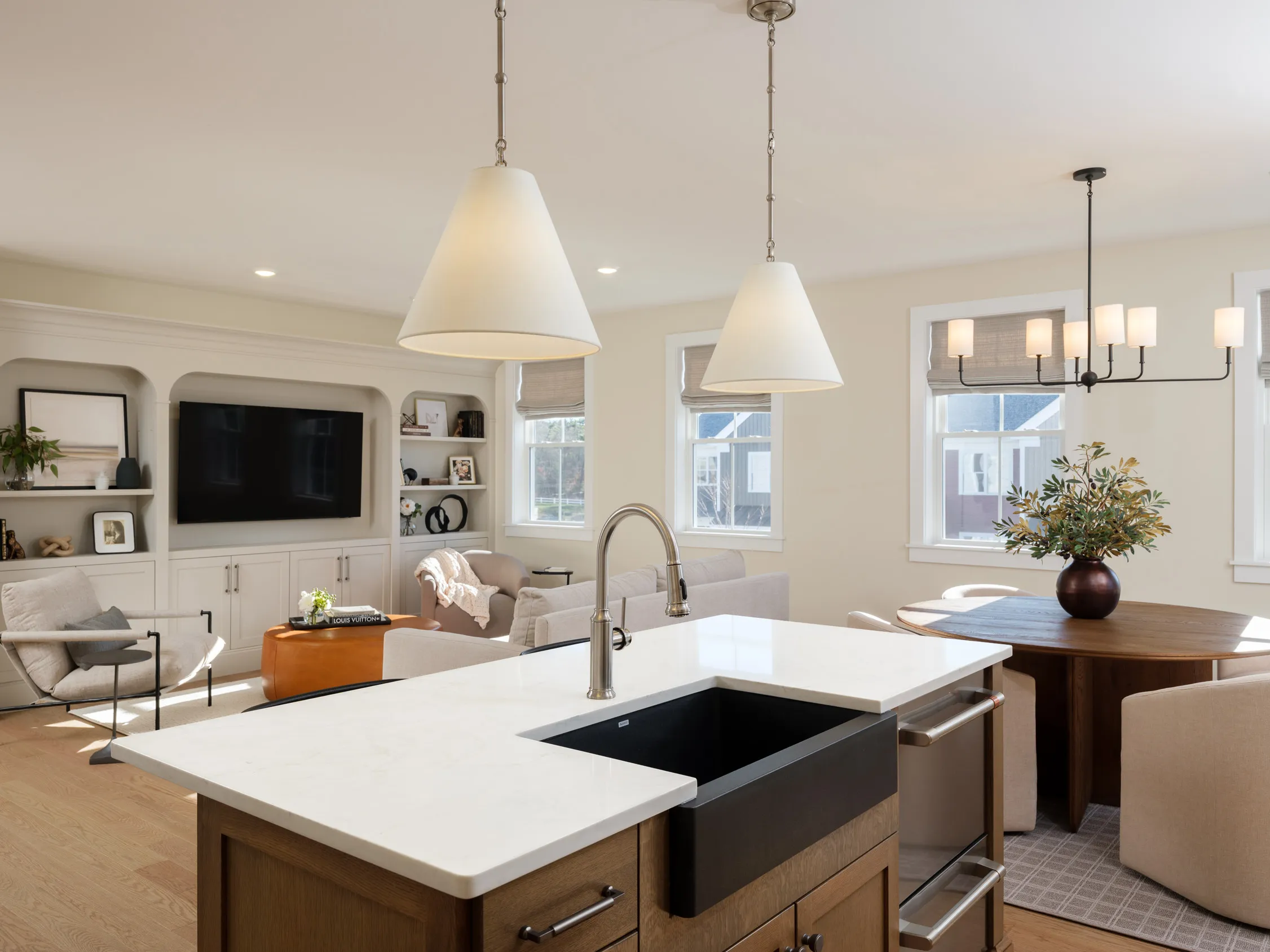 Open-concept kitchen and living area in the Pine at Alden's Reach in Plymouth MA